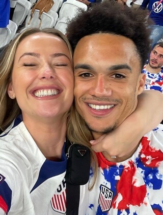 Antonee Robinson with his girlfriend, Darcy Myers.